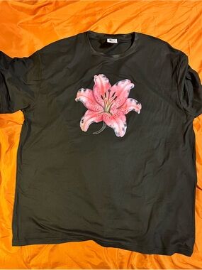 Woman Black Tee with Pink Lily Graphic
